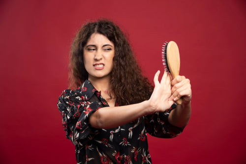 How Proper Hair Brushing Helps Reduce Knots and Tangles